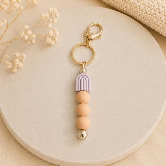 Boho Schlüsselanhänger Regenbogen Flieder – Taschenanhänger aus Edelstahl & Silikon | Handgefertigt 15 cm